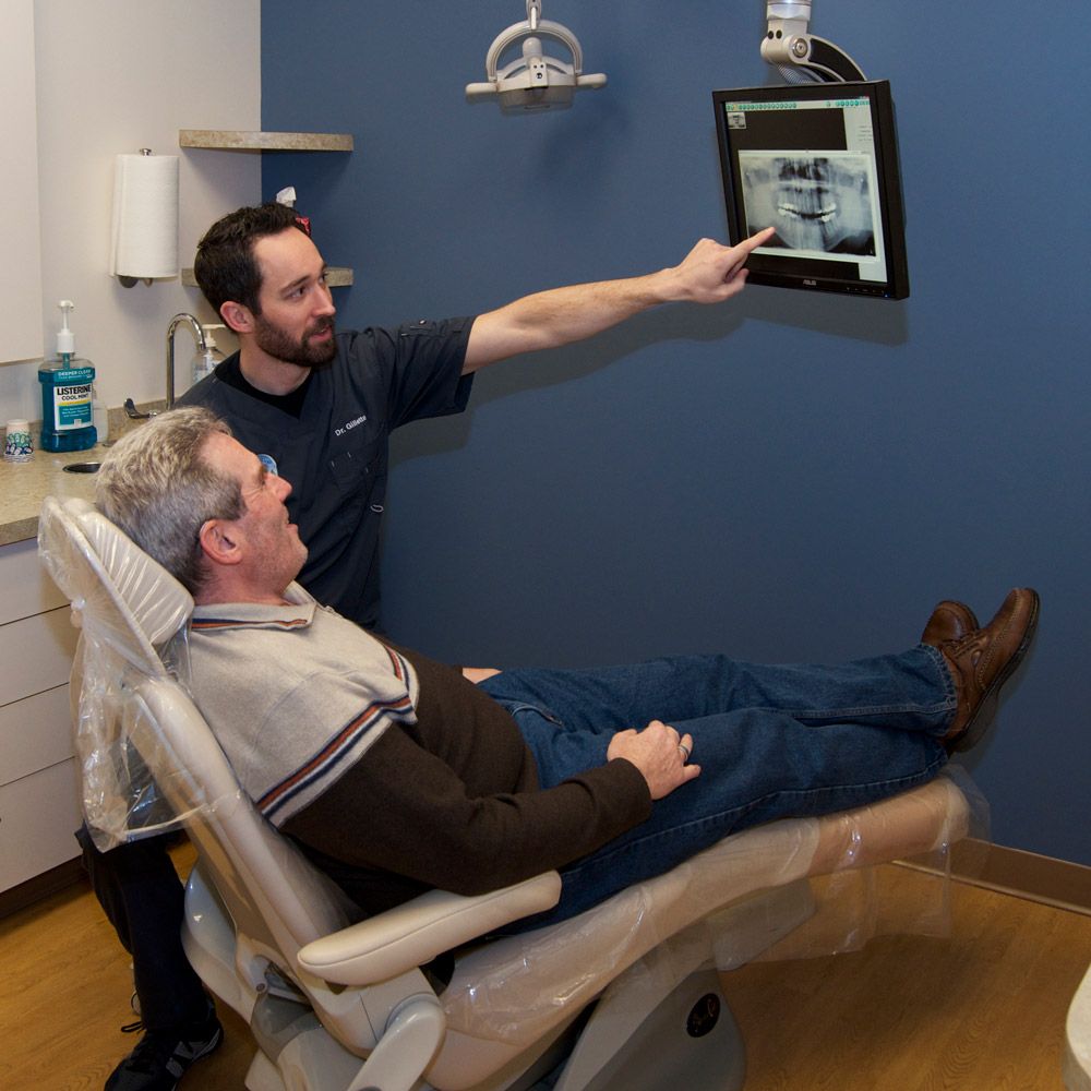 Dr. Gillette with a patient