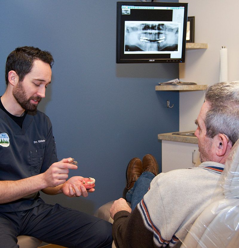 Dr. Gillette explaining a treatment process.